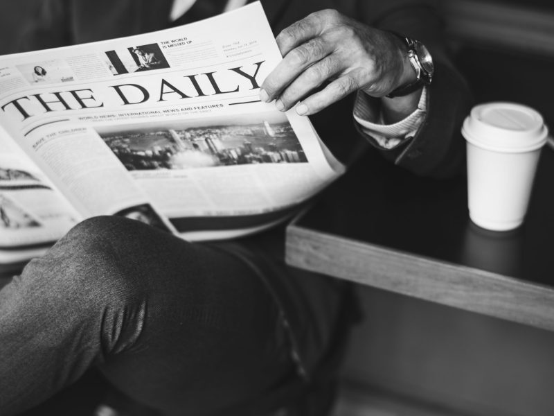 Businessman reading the daily news